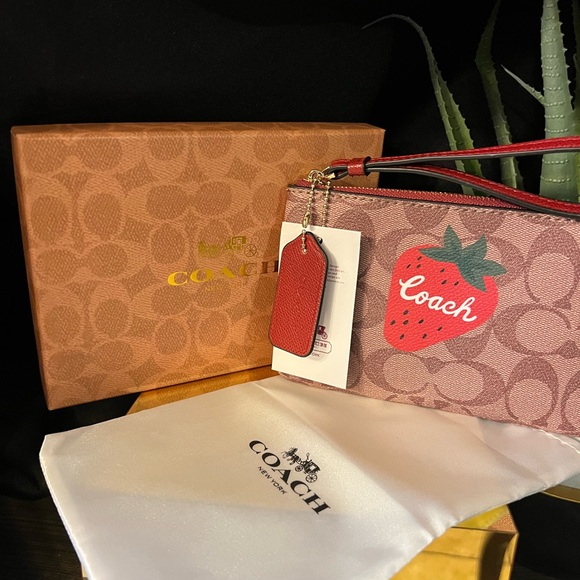 Coach Handbags - Coach Strawberry Signature Wristlet | NWT |Canvas w/ Box & Dust Bag